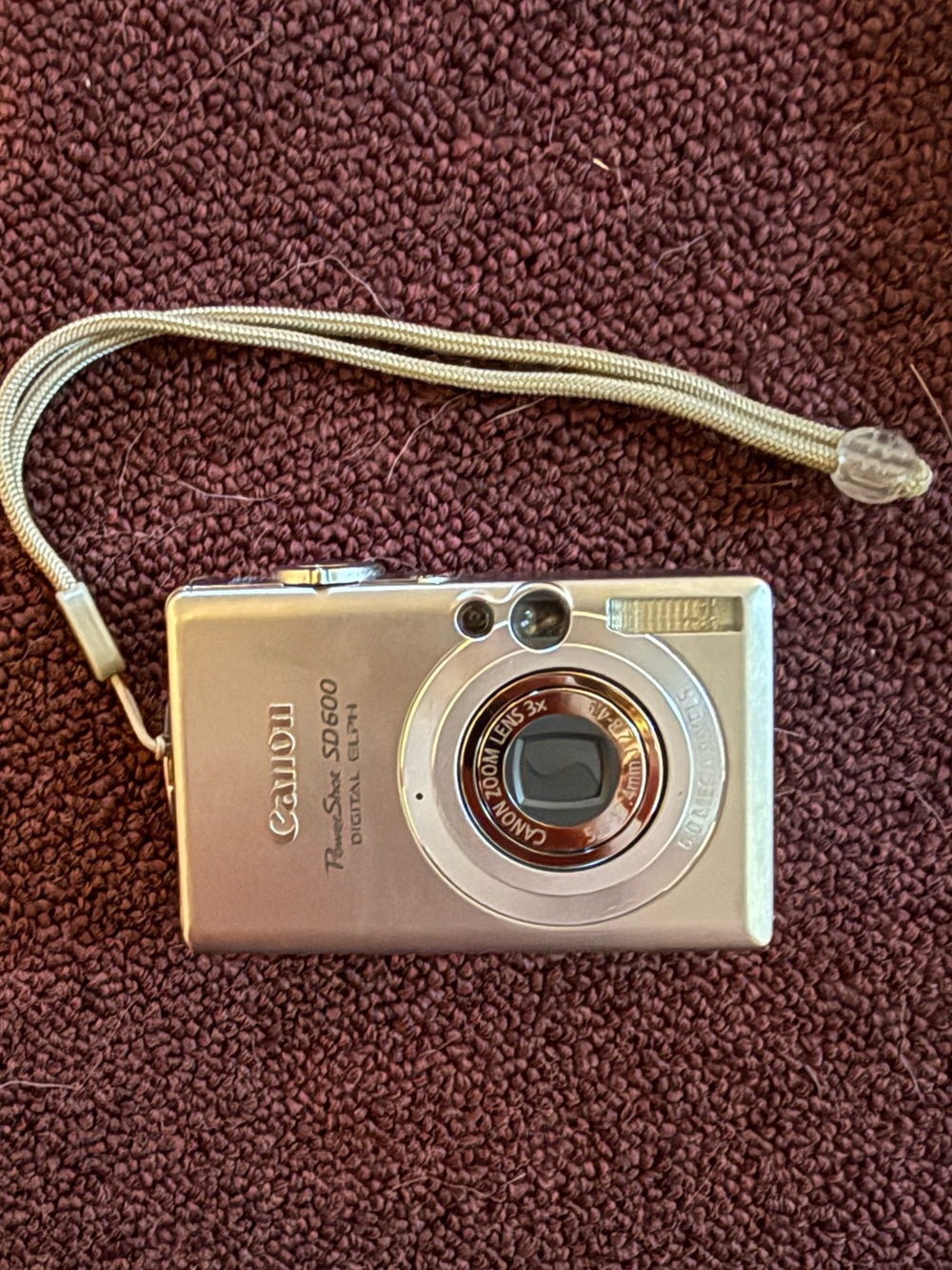 Canon Silver Compact Point-and-Shoot Digital Camera with Wrist Strap